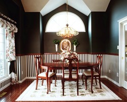 Adding crown molding or a chair rail to a room like the dining room makes a dramatic difference in the room's appearance.